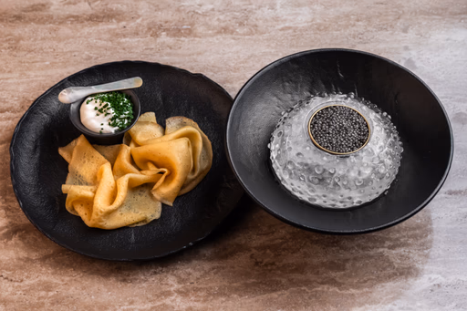 Sturgeon caviar / homemade crepes / sour cream